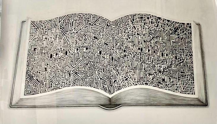 Drawing of an open book whose pages are densely filled with an interlocking maze pattern and hidden Spanish text, resembling a dense woodcut pattern.