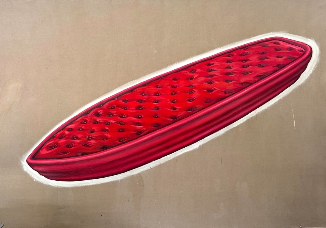 A painting of an elongated red tufted, quilted oval object resembling a padded boat or surfboard shape.
